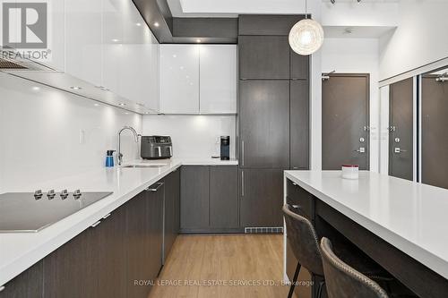 Granite Countertops and Integrated Appliances - 111 - 1284 Guelph Line, Burlington, ON - Indoor Photo Showing Kitchen With Upgraded Kitchen