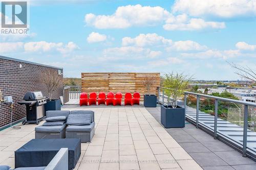 Rooftop Patio with BBQs, Dining and Lounge Areas - 111 - 1284 Guelph Line, Burlington, ON - Outdoor With Deck Patio Veranda