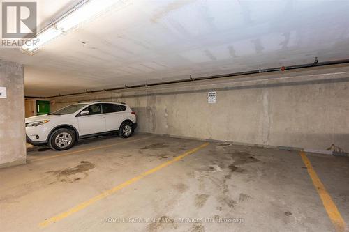 Visitor Parking Area in Underground Garage - 111 - 1284 Guelph Line, Burlington, ON - Indoor Photo Showing Garage