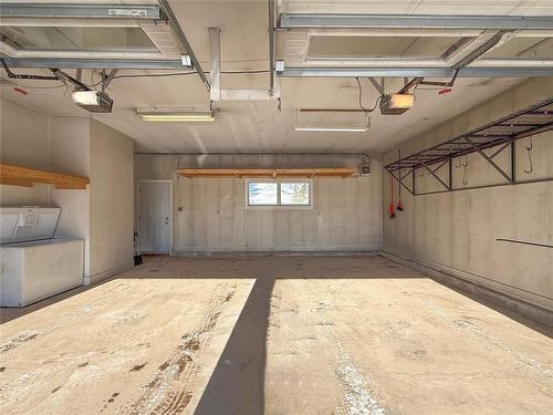 10 Jerome Drive, Brandon, MB - Indoor Photo Showing Garage