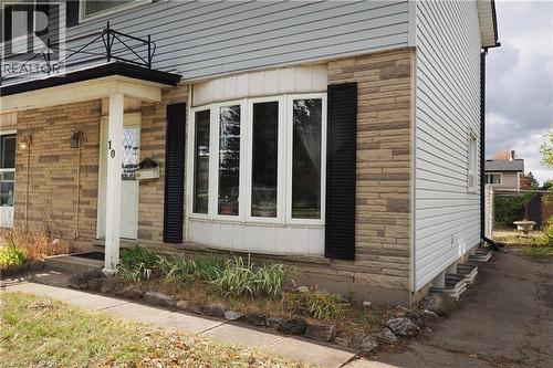 View of property exterior with stone siding - 10 Balfour Crescent, Kitchener, ON - Outdoor