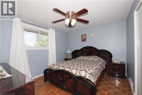 Bedroom featuring parquet floors and ceiling fan - 10 Balfour Crescent, Kitchener, ON - Indoor Photo Showing Bedroom