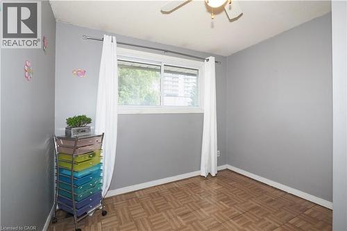 Empty room with parquet floors and ceiling fan - 10 Balfour Crescent, Kitchener, ON - Indoor Photo Showing Other Room
