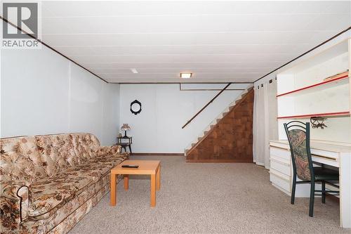 Living area with light colored carpet and stairway - 10 Balfour Crescent, Kitchener, ON - Indoor Photo Showing Other Room