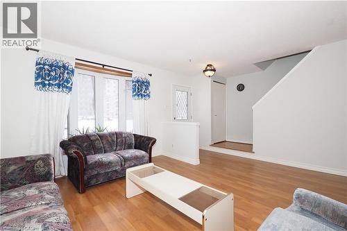 Living area featuring light wood finished floors and baseboards - 10 Balfour Crescent, Kitchener, ON - Indoor Photo Showing Living Room