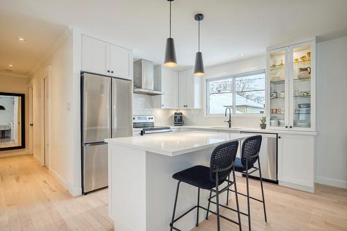 Cuisine - 24 Place Lévis, Saint-Bruno-De-Montarville, QC - Indoor Photo Showing Kitchen With Upgraded Kitchen