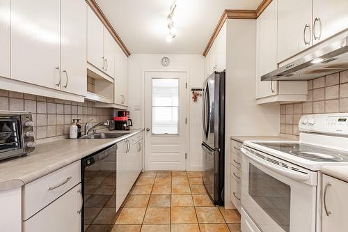 Cuisine - 995 Rue Coderre, Longueuil (Saint-Hubert), QC - Indoor Photo Showing Kitchen With Double Sink