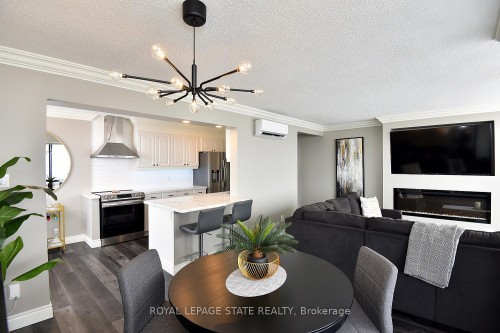 1707-75 Queen Street N, Hamilton, ON - Indoor With Fireplace