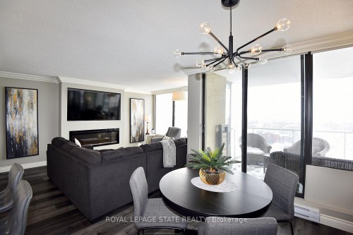 1707-75 Queen Street N, Hamilton, ON - Indoor Photo Showing Dining Room With Fireplace