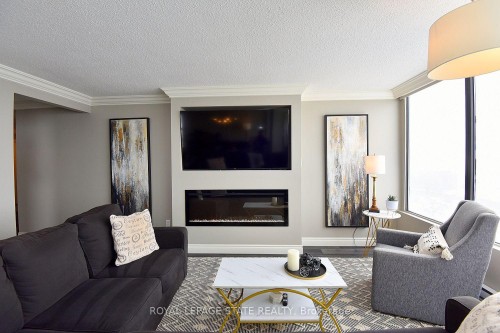 1707-75 Queen Street N, Hamilton, ON - Indoor Photo Showing Living Room With Fireplace
