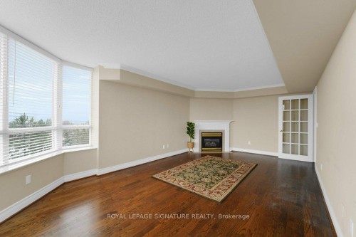 707-89 Skymark Drive, Toronto, ON - Indoor Photo Showing Other Room With Fireplace