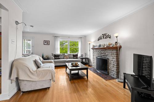 Salon - 1743  - 1745 Ch. Canora, Mont-Royal, QC - Indoor Photo Showing Living Room With Fireplace