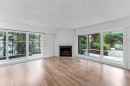 105-3277 Quadra St, Saanich, BC  - Indoor Photo Showing Living Room With Fireplace 