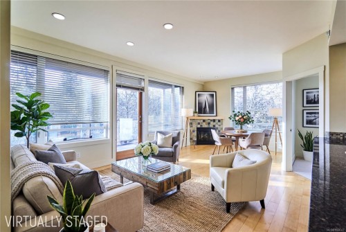 302-580 Stewart Ave, Nanaimo, BC - Indoor Photo Showing Living Room With Fireplace