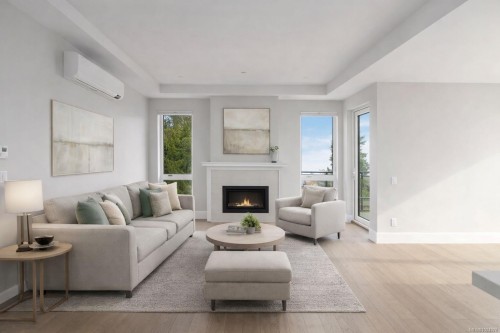 306-990 Doumac Ave, Saanich, BC - Indoor Photo Showing Living Room With Fireplace