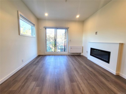 B503-1102 Esquimalt Rd, Esquimalt, BC - Indoor Photo Showing Other Room With Fireplace