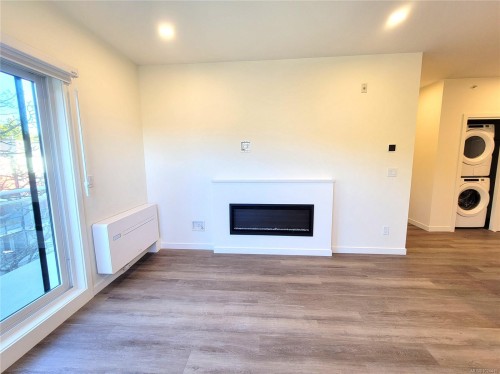 B503-1102 Esquimalt Rd, Esquimalt, BC - Indoor Photo Showing Living Room With Fireplace