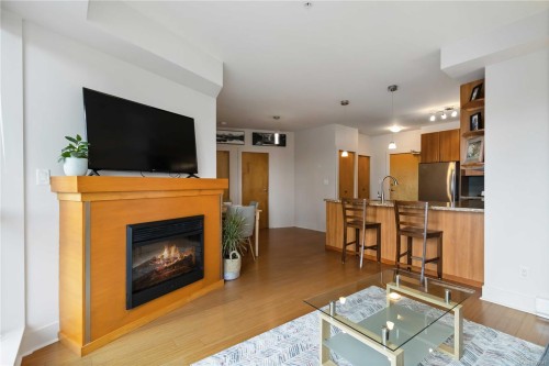 407-2745 Veterans Memorial Pkwy, Langford, BC - Indoor Photo Showing Living Room With Fireplace