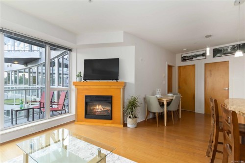 407-2745 Veterans Memorial Pkwy, Langford, BC - Indoor Photo Showing Living Room With Fireplace