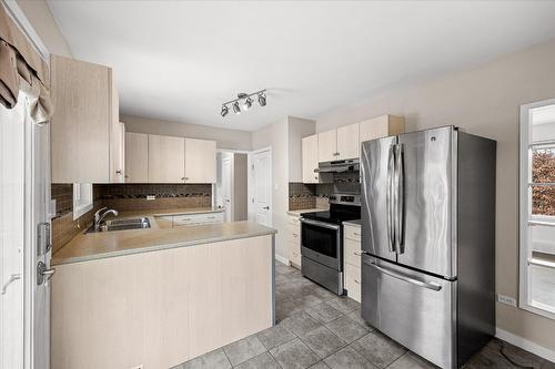 932-930 Lawson Avenue, Kelowna, BC - Indoor Photo Showing Kitchen With Double Sink