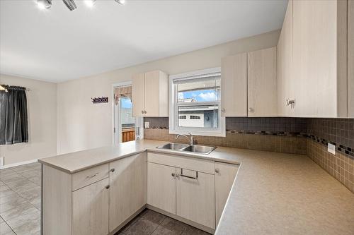 932-930 Lawson Avenue, Kelowna, BC - Indoor Photo Showing Kitchen With Double Sink