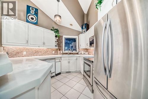 8373 Edgevalley Drive Nw, Calgary, AB - Indoor Photo Showing Kitchen With Upgraded Kitchen