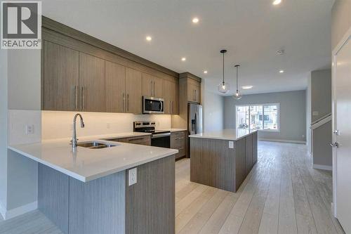 642 Rangeview Street Se, Calgary, AB - Indoor Photo Showing Kitchen With Stainless Steel Kitchen With Double Sink With Upgraded Kitchen