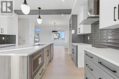 220 Waterford Heath, Chestermere, AB - Indoor Photo Showing Kitchen With Upgraded Kitchen