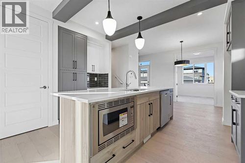 220 Waterford Heath, Chestermere, AB - Indoor Photo Showing Kitchen With Upgraded Kitchen