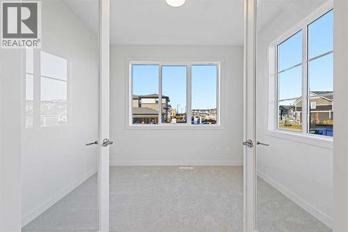 220 Waterford Heath, Chestermere, AB - Indoor Photo Showing Other Room