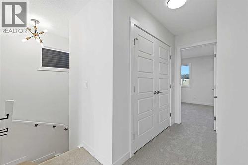 220 Waterford Heath, Chestermere, AB - Indoor Photo Showing Other Room
