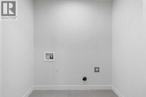 220 Waterford Heath, Chestermere, AB - Indoor Photo Showing Other Room