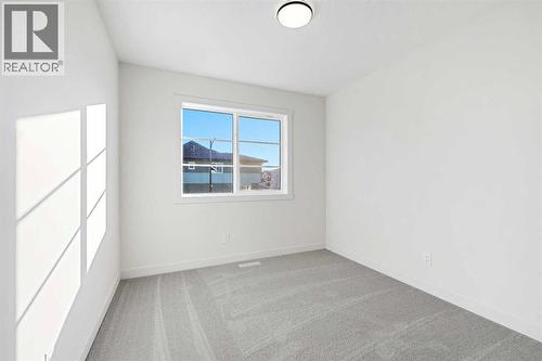 220 Waterford Heath, Chestermere, AB - Indoor Photo Showing Other Room