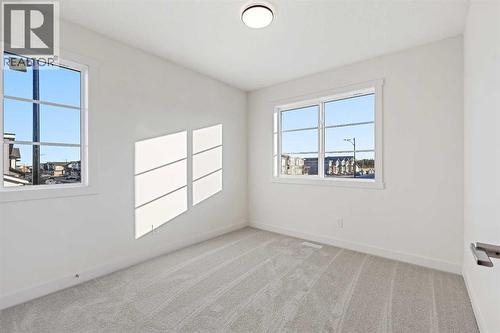 220 Waterford Heath, Chestermere, AB - Indoor Photo Showing Other Room