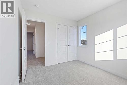 220 Waterford Heath, Chestermere, AB - Indoor Photo Showing Other Room
