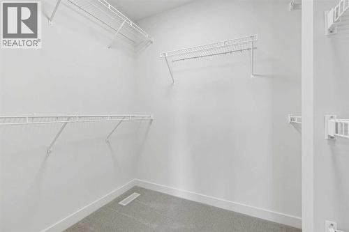 220 Waterford Heath, Chestermere, AB - Indoor With Storage