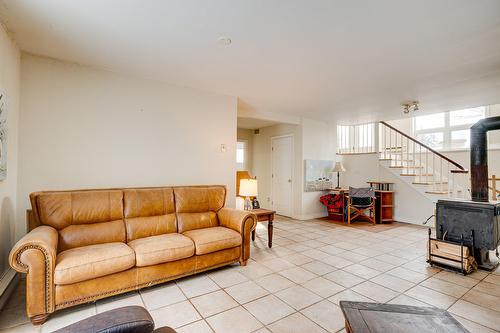 Salle de lavage - 1076 Rue Monette, Prévost, QC - Indoor Photo Showing Living Room