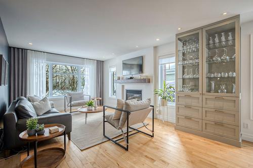 Salon - 2470 Rue Patenaude, Longueuil (Saint-Hubert), QC - Indoor Photo Showing Living Room With Fireplace