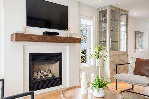 Salon - 2470 Rue Patenaude, Longueuil (Saint-Hubert), QC - Indoor Photo Showing Living Room With Fireplace
