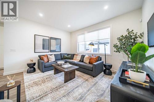 1149 Sailfin Heath, Rural Rocky View County, AB - Indoor Photo Showing Living Room