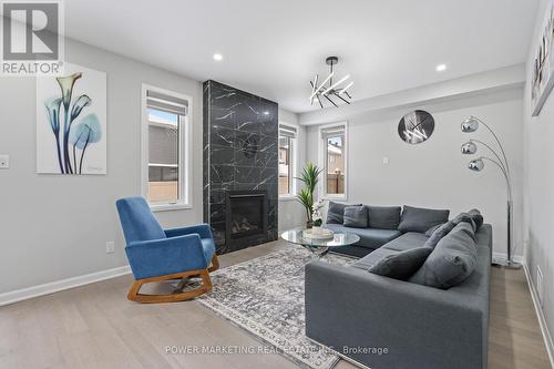143 Robin Easey Avenue, Ottawa, ON - Indoor Photo Showing Living Room With Fireplace