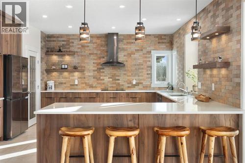 22 Bearspaw Summit Place, Rural Rocky View County, AB - Indoor Photo Showing Kitchen With Upgraded Kitchen