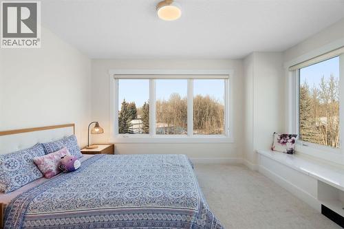 Bedroom 2- Upper Level - 22 Bearspaw Summit Place, Rural Rocky View County, AB - Indoor Photo Showing Bedroom