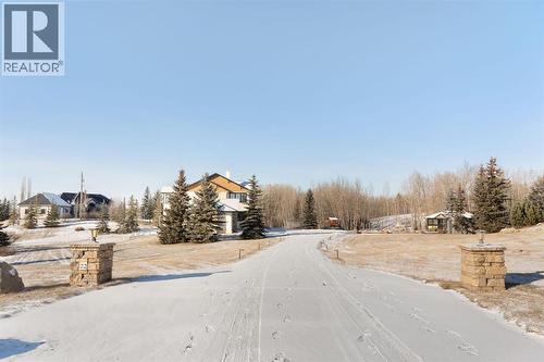 Driveway Entrance - 22 Bearspaw Summit Place, Rural Rocky View County, AB - Outdoor With View