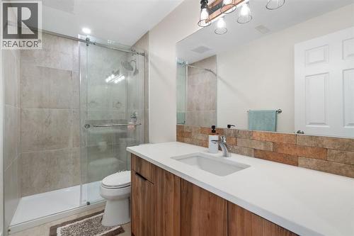 4pc Bathroom- Basement - 22 Bearspaw Summit Place, Rural Rocky View County, AB - Indoor Photo Showing Bathroom