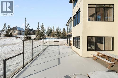Walk out Back Patio - 22 Bearspaw Summit Place, Rural Rocky View County, AB - Outdoor With Exterior