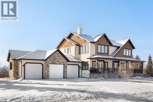 Front Elevation - 22 Bearspaw Summit Place, Rural Rocky View County, AB - Outdoor With Facade