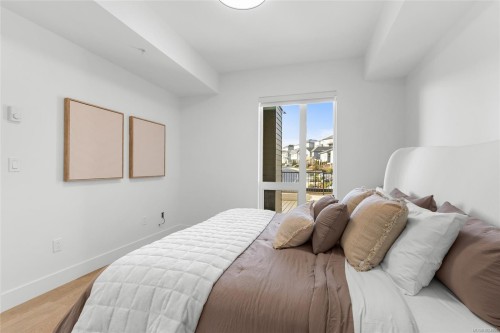 103-2341 Bear Mountain Pkwy, Langford, BC - Indoor Photo Showing Bedroom