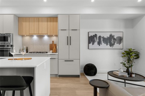103-2341 Bear Mountain Pkwy, Langford, BC - Indoor Photo Showing Kitchen With Upgraded Kitchen