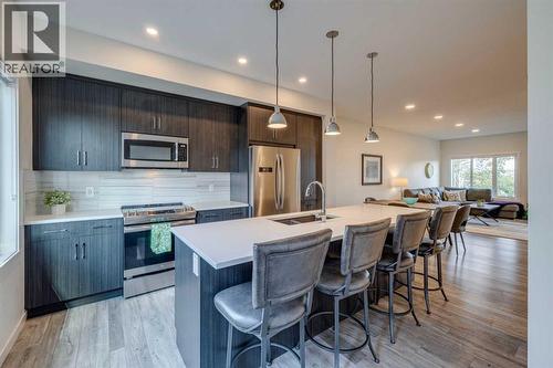 614 Greenbriar Common Nw, Calgary, AB - Indoor Photo Showing Kitchen With Upgraded Kitchen